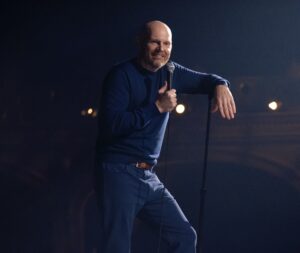 Bill Burr performing his Hulu special Drop Dead Years, delivering sharp, introspective comedy about family and society
