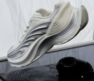 Adidas Chunky XLG sneaker with exaggerated platform sole and layered materials in bold, modern design