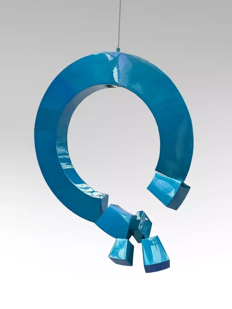 Santiago Lozano’s Hanging Collapse (Blue) sculpture, featuring suspended blue elements evoking balance and fragility