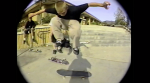 Archival footage showing skaters performing tricks in urban settings, set to 90s hip-hop beats and street culture aesthetics