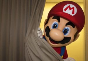 Silhouette of a gaming console resembling the Nintendo Switch, with a tagline “Switch to the Future” teased by Walmart