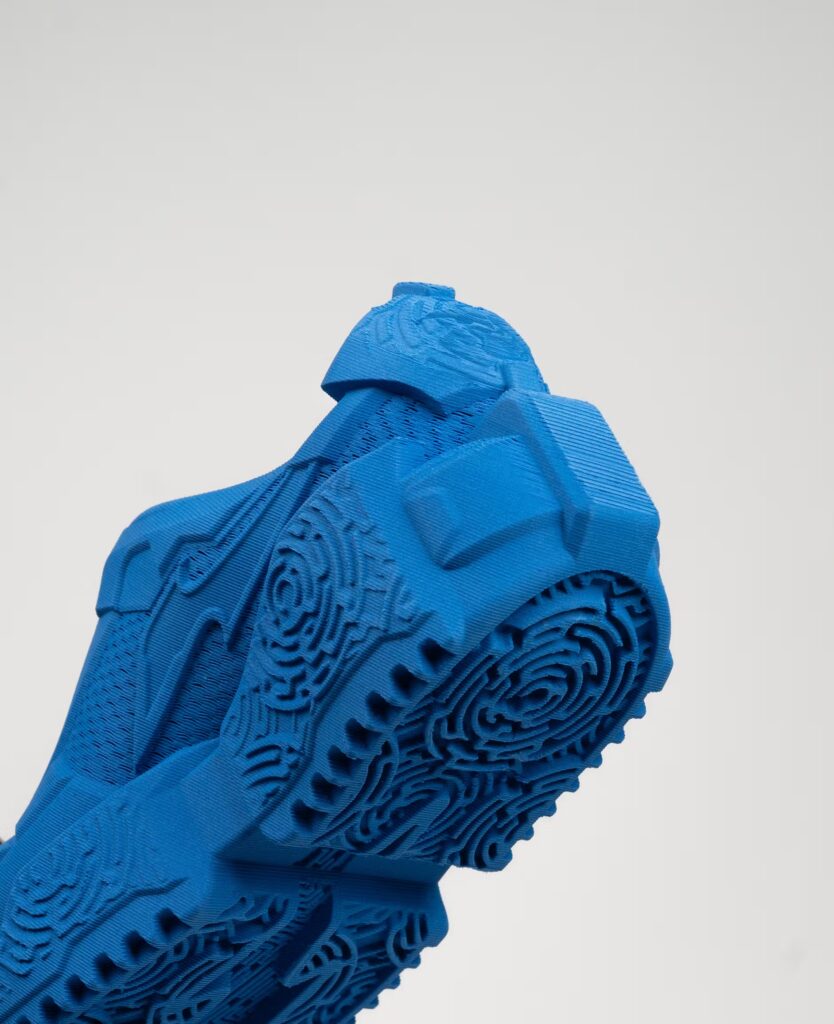 RTFKT’s final MNLTH X Blade collection featuring 3D-printed sneakers by Zellerfeld, merging fashion and NFT technology