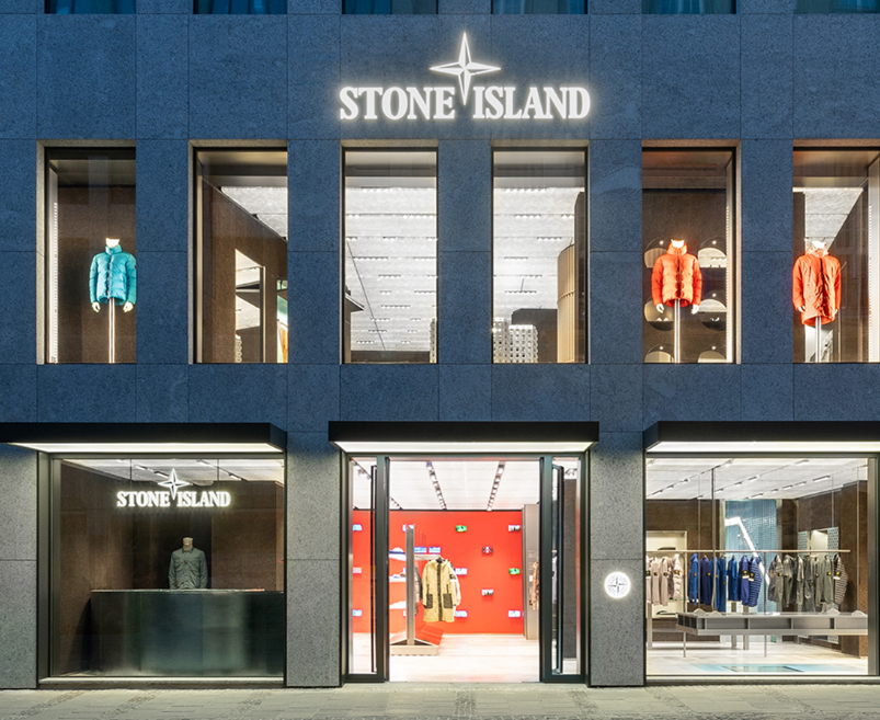 Stone Island’s new Milan showroom interior, featuring innovative designs and functional elements unveiled during Fashion Week