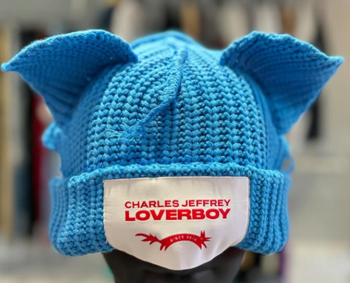Close-up of the Loverboy knit hat featuring bold colors, textured knit, and artistic design by Charles Jeffrey Loverboy