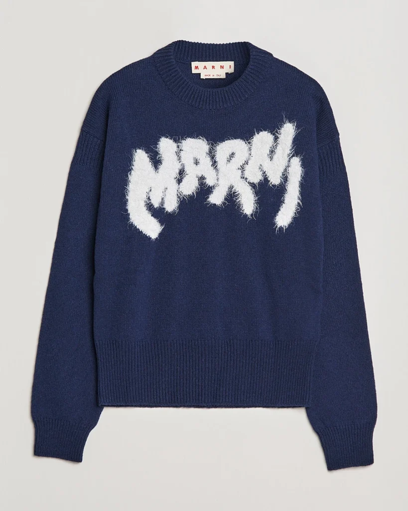 A luxurious Marni Mohair Logo Sweater in navy, featuring bold branding and a soft, textured finish for an elevated look