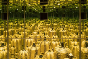 Yayoi Kusama’s Mirror Room (Pumpkin), featuring polka-dotted pumpkins reflected infinitely in mirrored walls