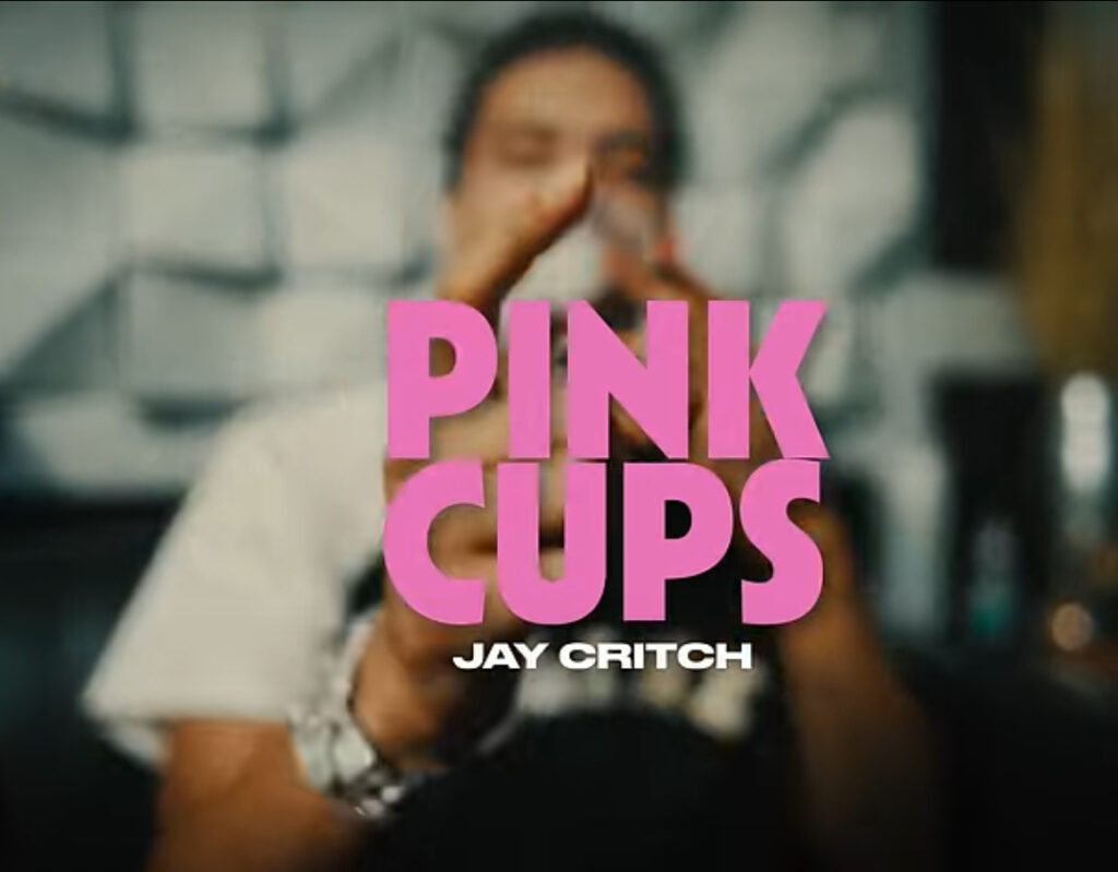 Jay Critch performing “Pink Cups” with vibrant visuals, showcasing his signature style during the Laron era of his career
