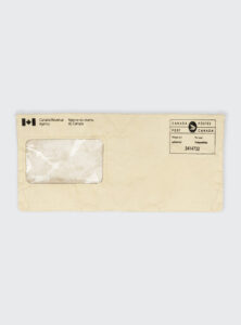 CRA Envelope Bag M224080HYB with Tyvek fabric, transparent vinyl window, and detachable strap by Hybrid Clothing Canada