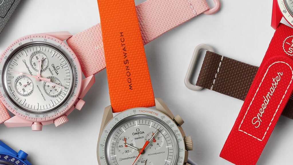 A close-up of the Swatch x Omega MoonSwatch bi-color rubber straps in various color combinations with quick-release features