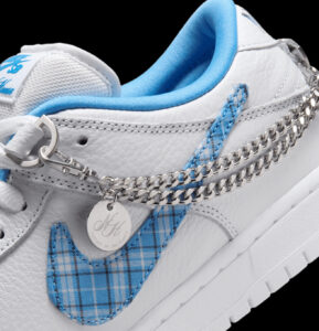 A detailed view of the Nicole Hause x Nike SB Dunk Low Pro ‘White University Blue’ featuring premium leather and unique design elements
