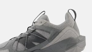 A pair of New Balance Tektrel hiking shoes featuring a rugged design, trail-ready grip, and retro-inspired aesthetics