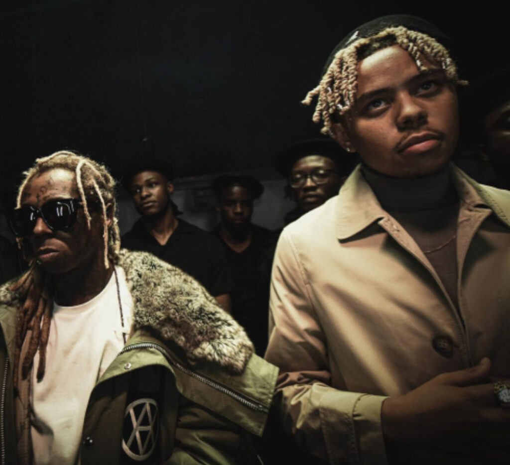 Cordae and Lil Wayne in the “Sinister” music video, showcasing their lyrical skills with powerful visuals and themes