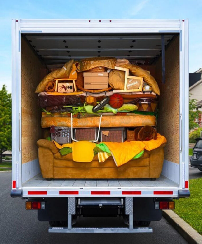 McDonald’s Happy Moving Day campaign ad featuring a delivery bag placed on moving boxes, highlighting convenience and humor