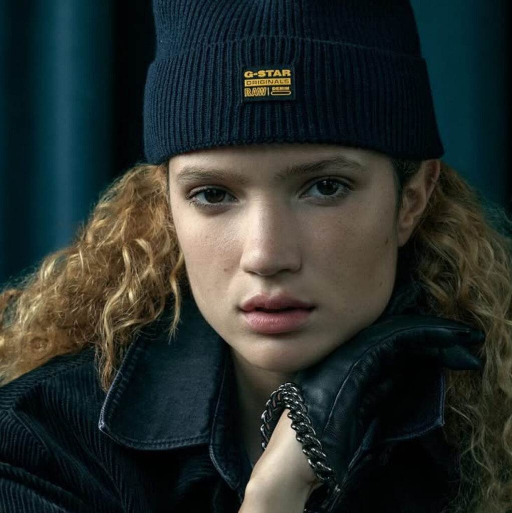 G-Star RAW 2025 collection showcasing sustainable denim pieces and innovative outerwear designs in a modern retail space