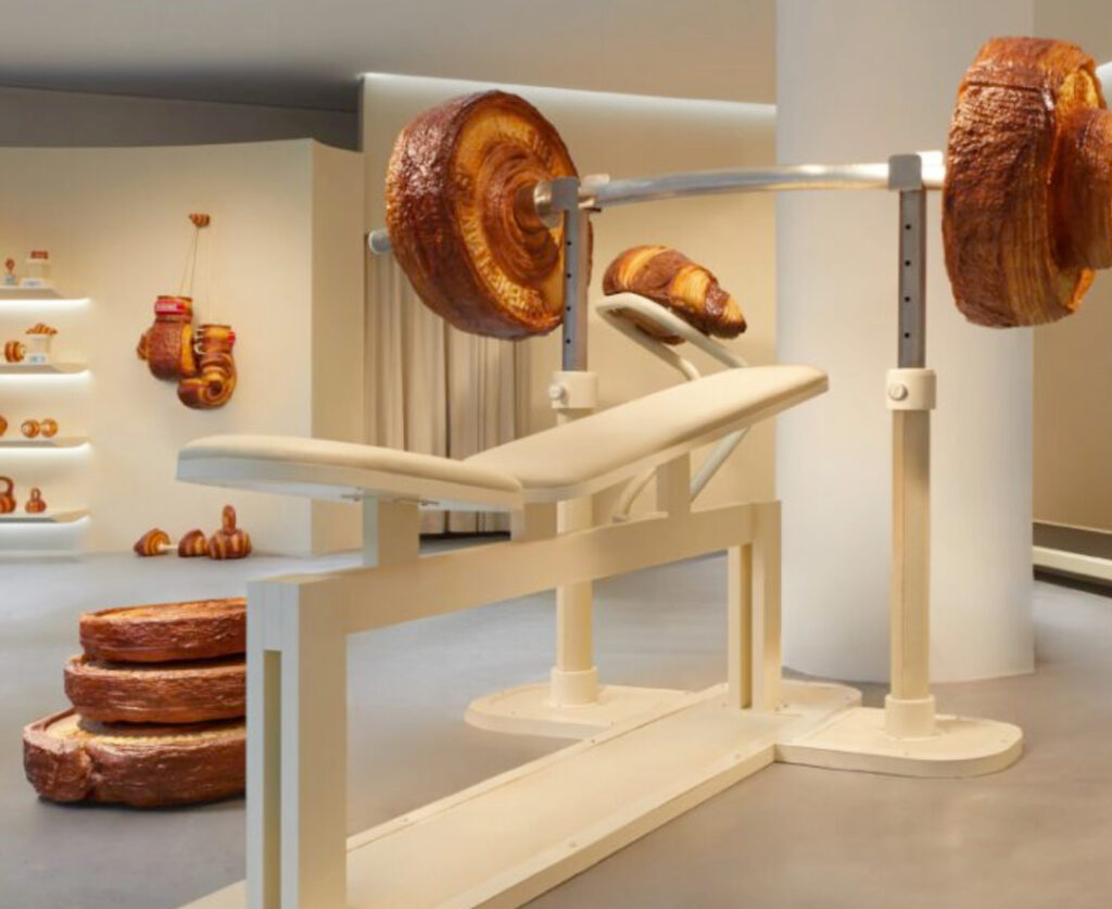 NUDAKE café seamlessly blending digital and physical experiences to create a unified brand world through design and storytelling