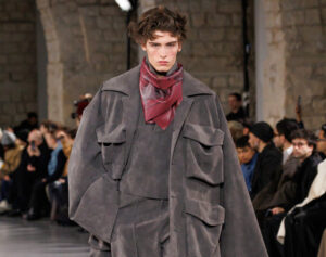 Model wearing Sean Suen Fall/Winter 2025 collection at Paris Fashion Week, featuring layered textures and cultural motifs