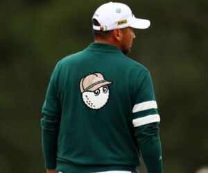 Jason Day wearing a Malbon Golf jacket before the Farmers Insurance Open, later asked to remove it due to logo regulations