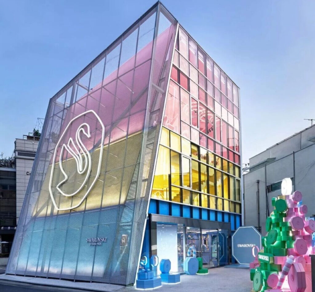 Swarovski Instant Wonder store featuring vibrant colors, crystal displays, and immersive design elements