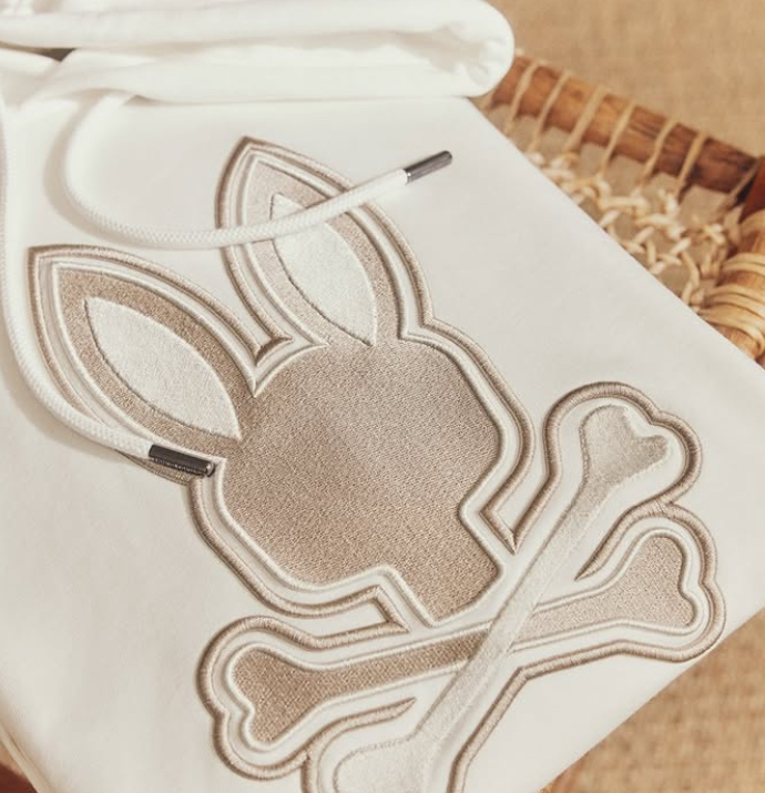 A stylish Psycho Bunny Neutral Staple Hoodie in a soft neutral shade, featuring premium cotton fabric and subtle branding