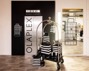 OLAPLEX Leave-In Conditioner launch event featuring luxury haircare, styling sessions, and interactive beauty experiences