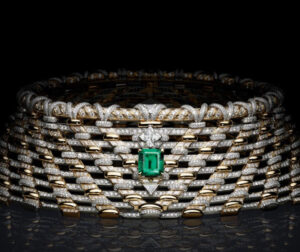 A dazzling high jewelry piece from the Awakened Hands, Awakened Minds Collection, featuring diamonds, sapphires, and emeralds