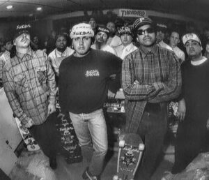 Suicidal Tendencies outside Streets of Venice Records & Skateshop in 1987, captured by Chuck Katz, embodying skate punk culture