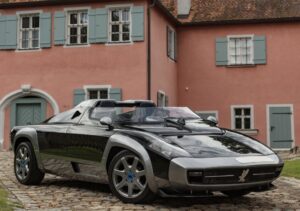 A rare Isdera 036i Spyder, a handcrafted 1980s German sports car, featuring a lightweight fiberglass body and open-top design