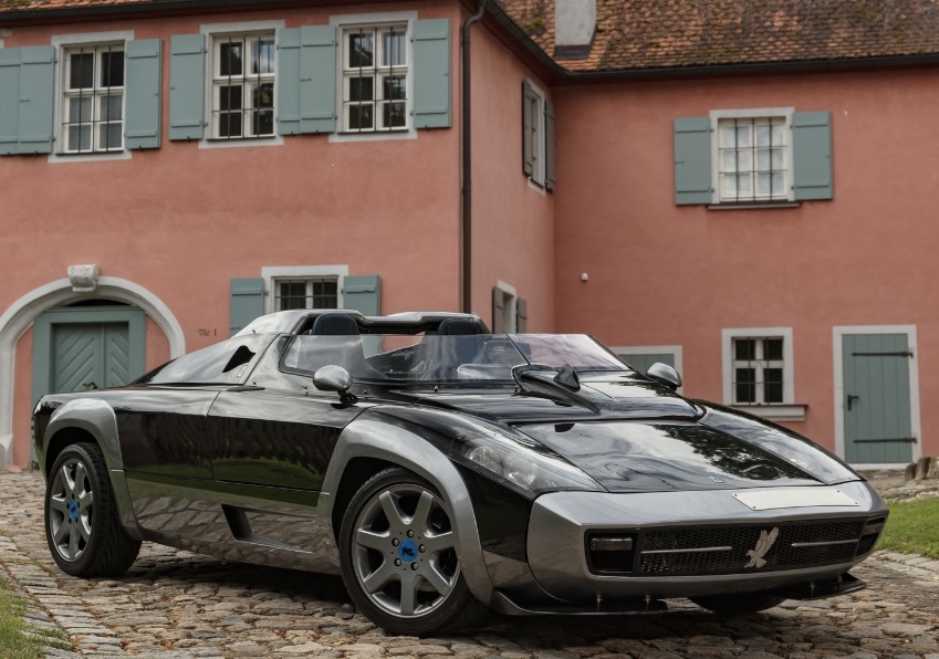 A rare Isdera 036i Spyder, a handcrafted 1980s German sports car, featuring a lightweight fiberglass body and open-top design
