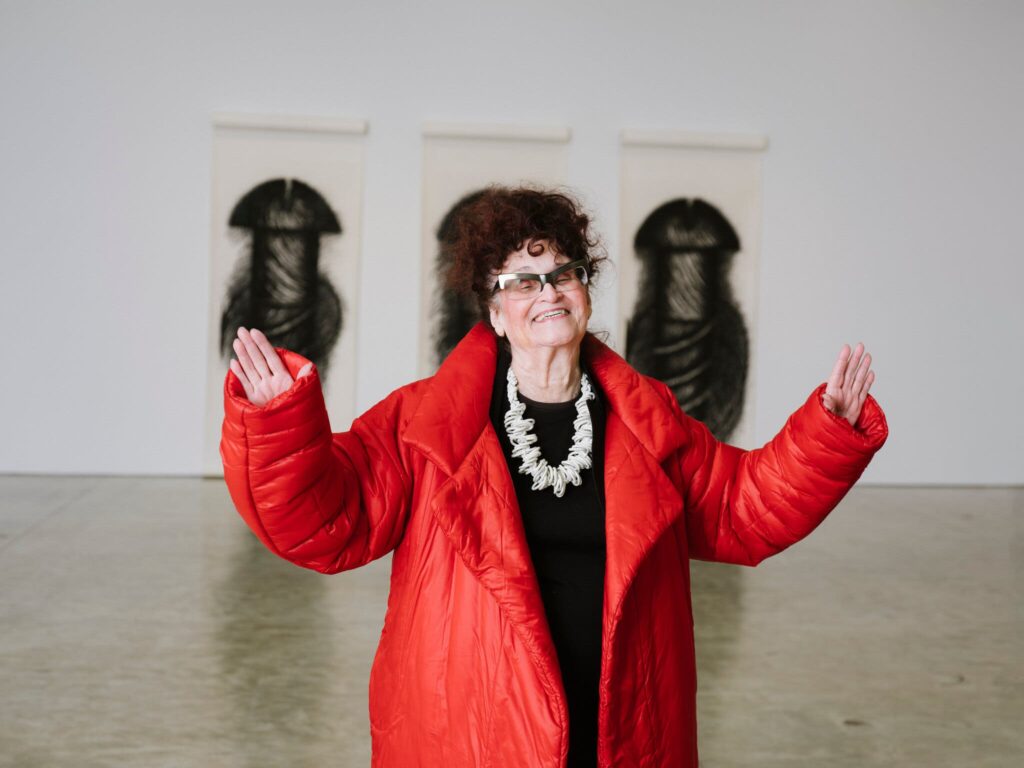 Artist Judith Bernstein stands in front of her large-scale provocative artwork, part of her Public Fears exhibition at 82