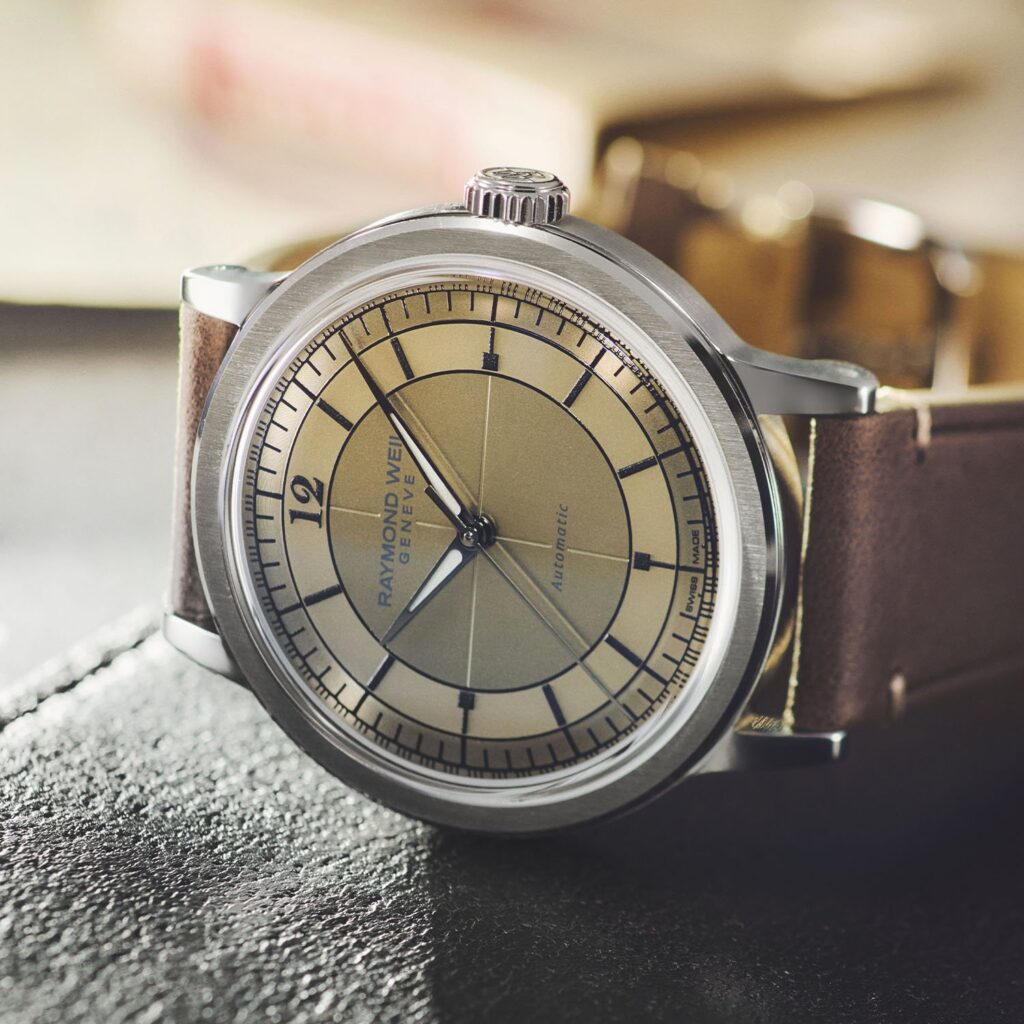 A close-up of the Shellman x Raymond Weil Millésime, showcasing its champagne-toned sector dial and elegant vintage-inspired design