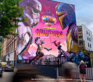 A massive, vibrant mural of Star Wars: Hunters characters in London, celebrating the game’s Galactic Unveiling