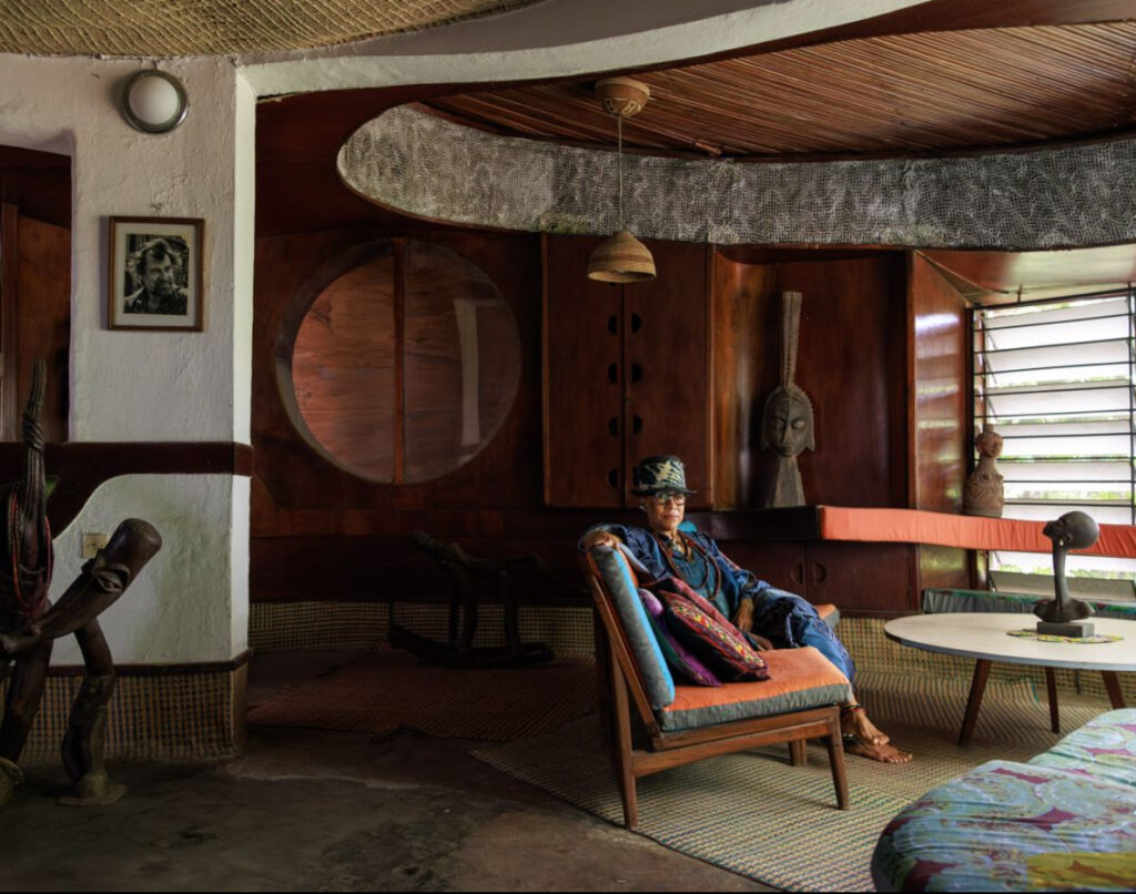 Exterior and interior views of the Alan Vaughan-Richards House, showcasing its circular design and modernist African architecture