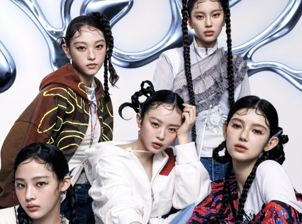 NJZ performing live on stage at ComplexCon Hong Kong 2025, captivating the audience with their high-energy K-pop performance