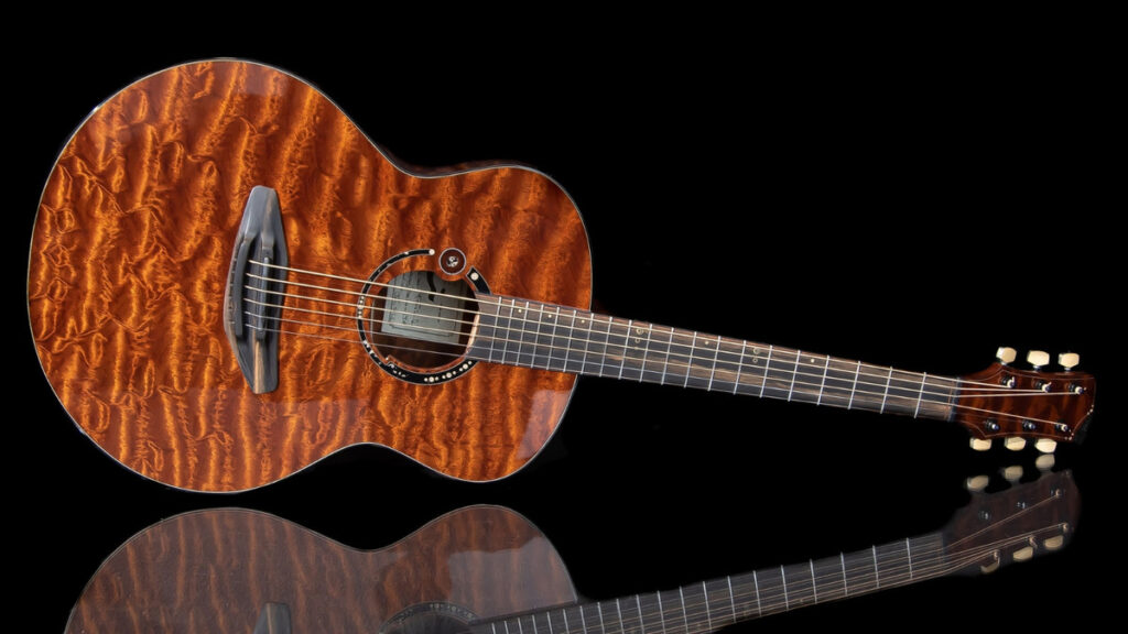 A highly figured mahogany guitar crafted from The Tree, showcasing its rare quilted grain and rich tonal qualities