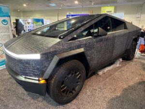 A Tesla Cybertruck fitted with Sunflare Solar’s flexible solar panel wrap, enhancing range and off-grid capabilities