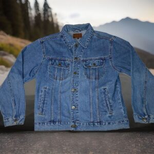 A vintage Lee Cowboy Jacket displayed on a rustic background, highlighting its Western design, durable denim, and classic fit