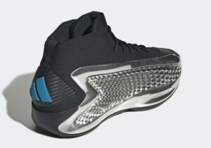 A close-up of the adidas Anthony Edwards 1 Chrome, featuring a sleek, reflective chrome finish and high-performance design