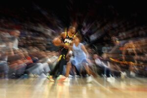 Kevin Durant celebrates reaching 30,000 career points during a Phoenix Suns game, joining the NBA’s elite scorers