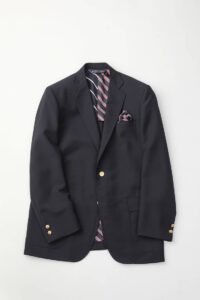 A sophisticated navy blazer featuring dual tags from the Brooks Brothers x SOPHNET. collaboration, showcasing the blend of American traditional and Japanese design