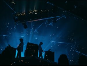 Justice performing live at their 2025 Hyperdrama tour, blending classic hits with modern electronic music innovations