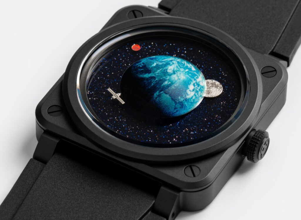 Bell & Ross BR-03 Astro Watch featuring orbiting celestial bodies, including Earth, Moon, and Mars, on a blue aventurine 'space' background