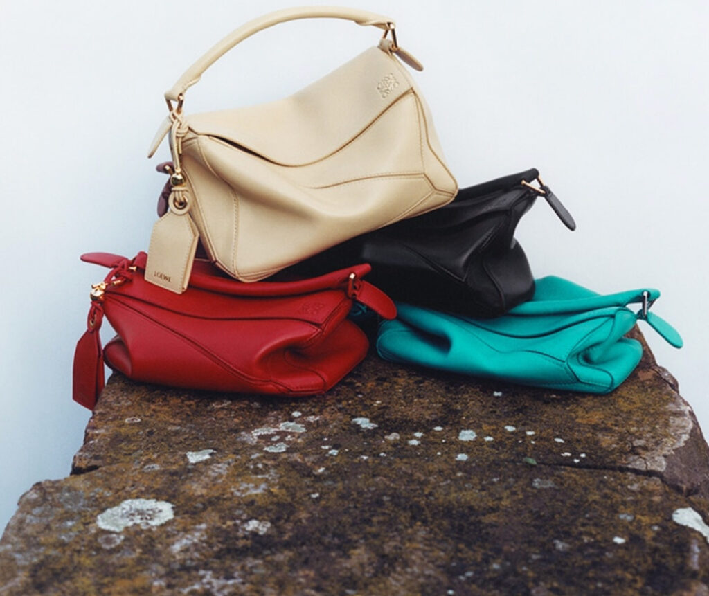 The elegant LOEWE Featherlight Puzzle bag, crafted from luxurious nappa lambskin for a soft, lightweight, and stylish designer accessory