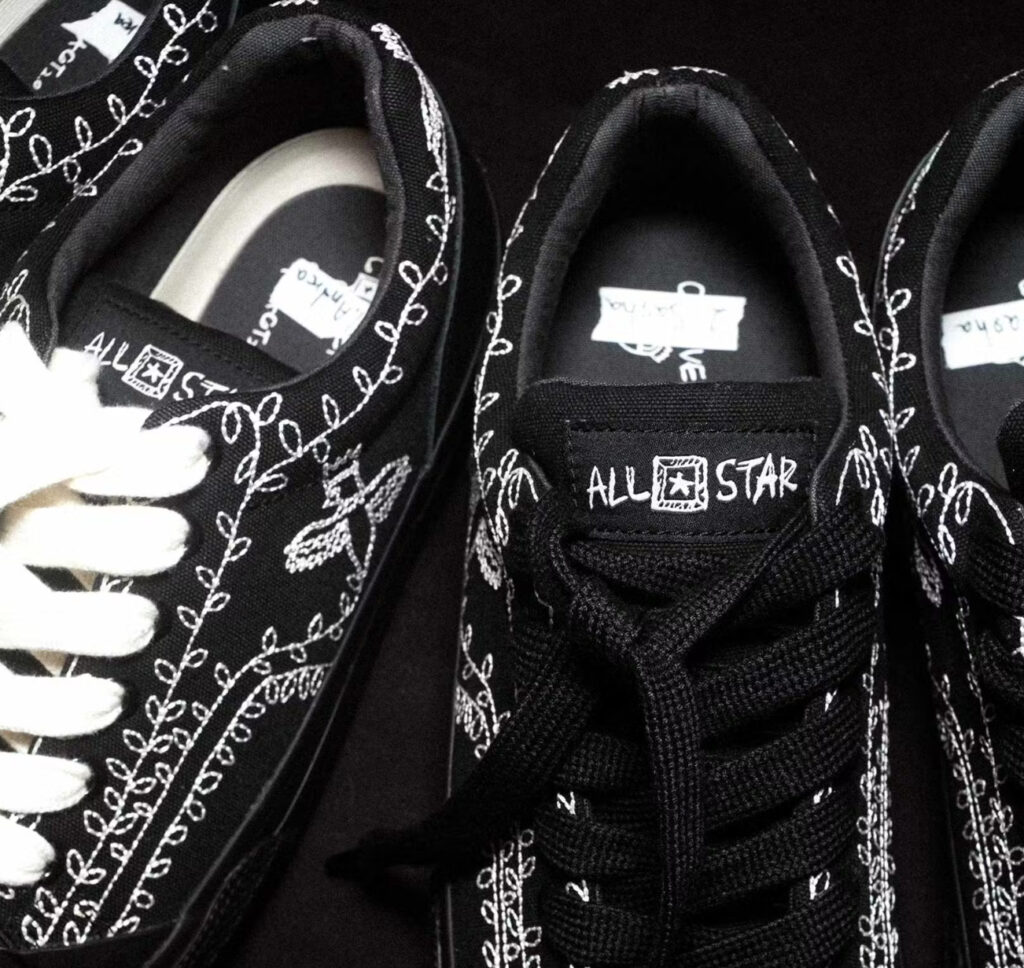 A close-up of the limited-edition Converse sneaker designed by fashion maestro Shinya Kozuka, highlighting its unique aesthetic blend of muted and bold elements
