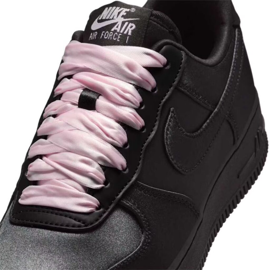 A sleek, all-black Air Force1 sneaker, symbolizing the evolution of the iconic design from rebellious to refined