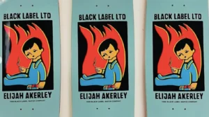 Elijah Akerley's 'Fire Starter' skateboard deck from Black Label, featuring vibrant red and orange graphics on a 7-ply hardwood maple construction