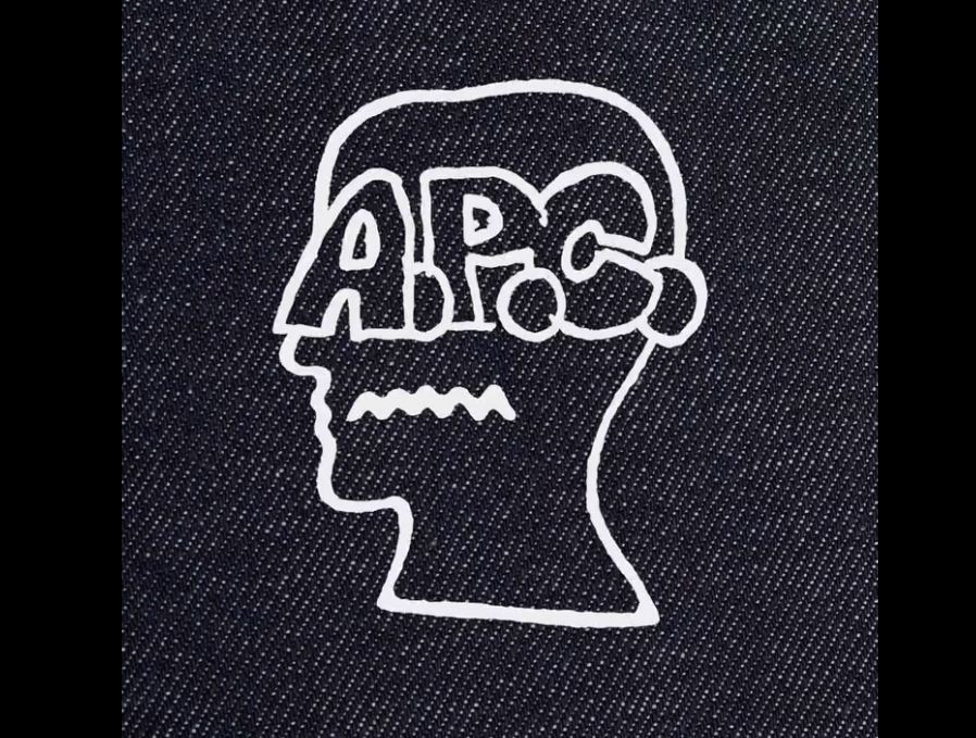 A.P.C. x Brain Dead raw denim jacket and pants, featuring a co-branded emblem and wide-legged fit