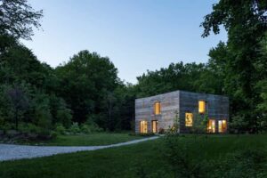 nARCHITECTS' CLT House, a sustainable lakeside residence showcasing cross-laminated timber and harmonizing with nature