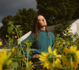 Isabel Pless performing "Workhorse," a heartfelt indie anthem that delves into the emotional toll of constantly striving to meet expectations