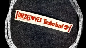 Logo representing the 'Diesel Loves' collaboration between Diesel and Timberland, highlighting their commitment to sustainability and eco-conscious practices