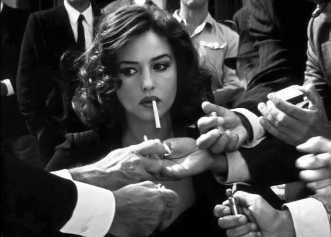 A still from "Malèna," showcasing the film's captivating portrayal of rural Italian life during the post-war era